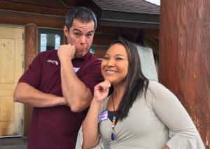 Vina Little Owl, Assistant Controller, and Charlie Blood, Accounting Clerk, take a a break from smiling.